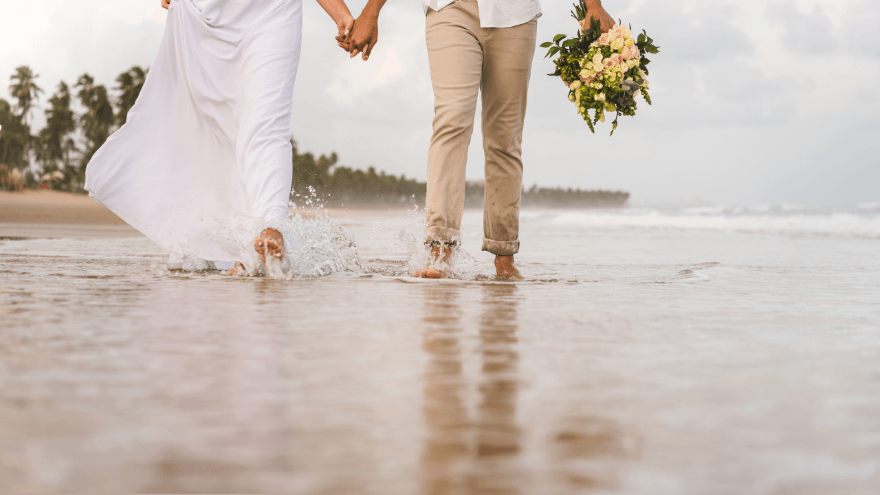 A couple walking on the beach