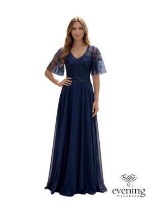 Woman wearing Style 1273 in Twilight Blue, a chiffon A-line evening gown with floral beaded bodice, V-neckline, tulle flutter sleeves and sheer embellished back.