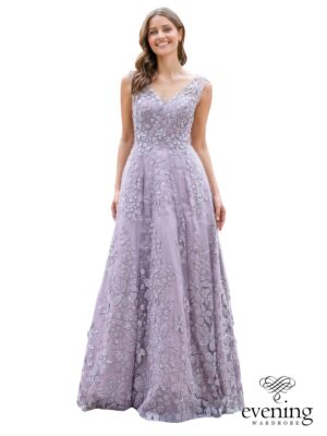 Woman wearing Style 1143 in Purple Sage, a floor-length floral lace A-line evening gown with 3D flowers, V-neckline, slender straps and lace-up back.