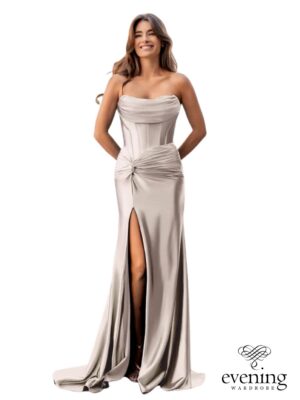 Model wearing a strapless satin mermaid matric farewell dress with a draped corset bodice, knotted waist detail, high leg slit, lace-up back and soft train.
